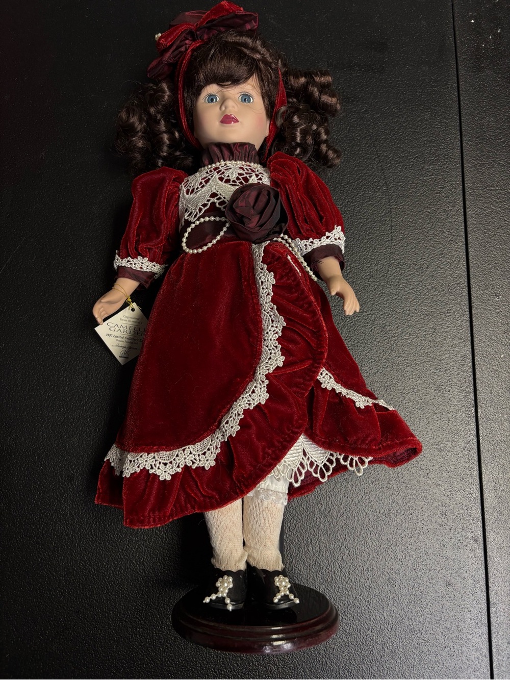 Collectible Red Velvet Porcelain Doll with Lace Dress